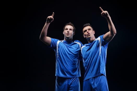soccer players celebrating victory photo