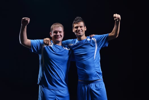 soccer players celebrating victory photo
