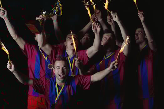 soccer players celebrating victory photo