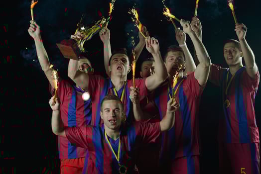 soccer players celebrating victory photo
