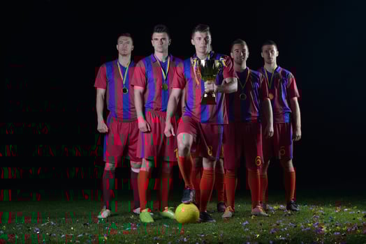 soccer players celebrating victory photo