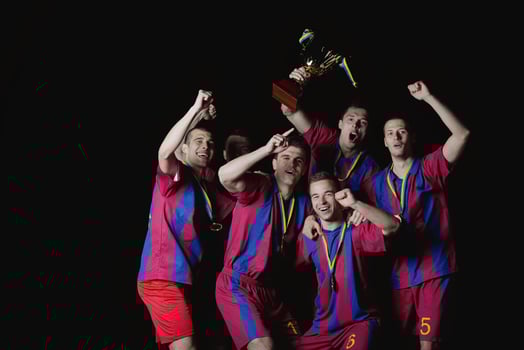 soccer players celebrating victory photo