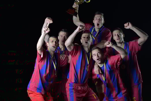 soccer players celebrating victory photo