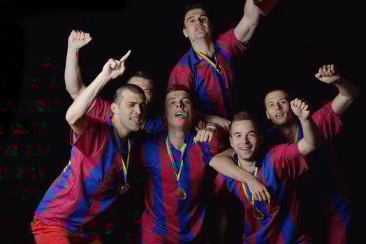 soccer players celebrating victory photo