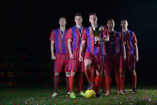 soccer players celebrating victory photo