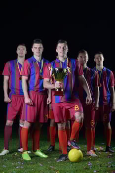 soccer players celebrating victory photo