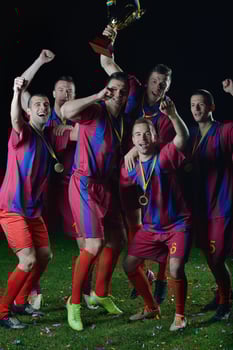 soccer players celebrating victory photo