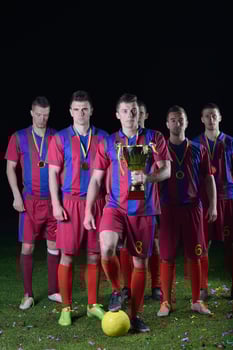 soccer players celebrating victory photo