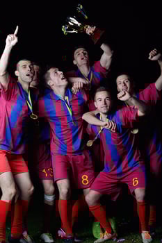 soccer players celebrating victory photo