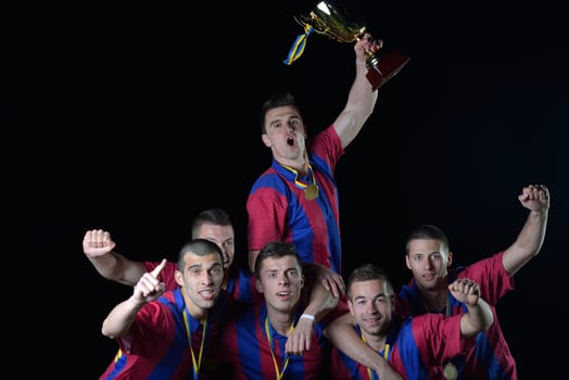 soccer players celebrating victory photo