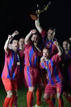 soccer players celebrating victory photo