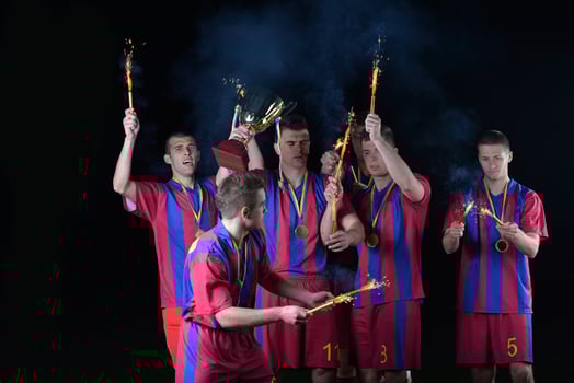 soccer players celebrating victory photo