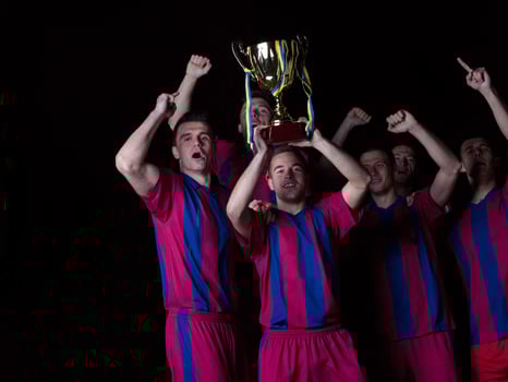 soccer players celebrating victory photo