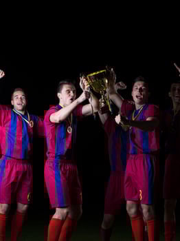 soccer players celebrating victory photo