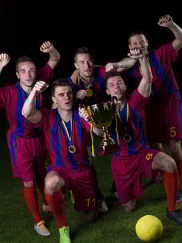 soccer players celebrating victory photo