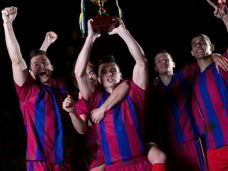 soccer players celebrating victory photo