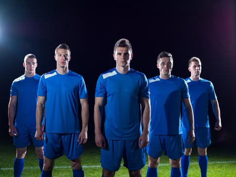 soccer players celebrating victory photo