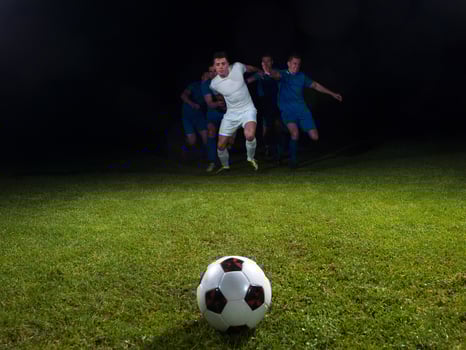 soccer players duel photo