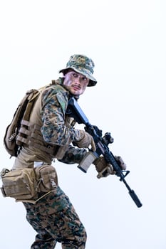 soldier in action aiming laseer sight optics photo