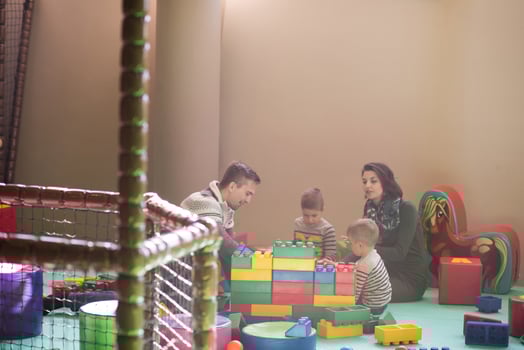 parents having fun with kids photo