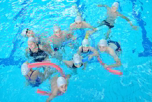 children group  at swimming pool photo