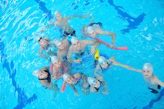 children group  at swimming pool photo