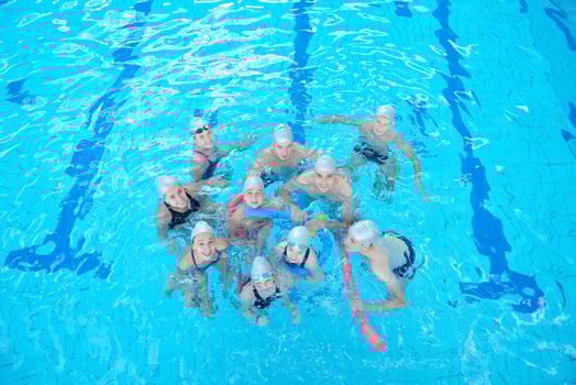 children group  at swimming pool photo
