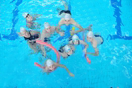 children group  at swimming pool photo