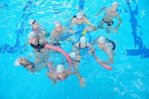 children group  at swimming pool photo