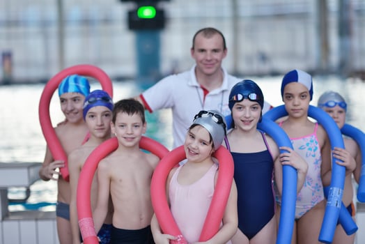 happy children group  at swimming pool photo