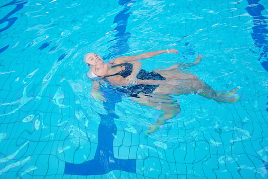 help and rescue on swimming pool photo