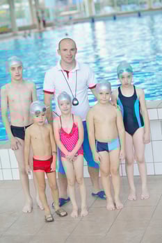 children group  at swimming pool photo