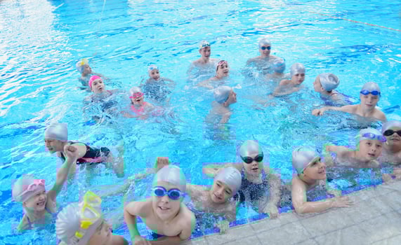 children group  at swimming pool photo