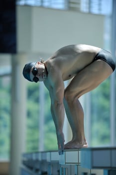 young swimmer ready for start photo