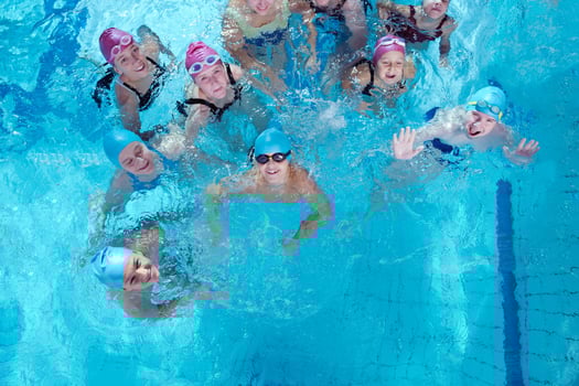 happy children group  at swimming pool photo