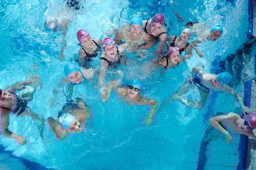 happy children group  at swimming pool photo