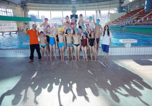 happy children group  at swimming pool photo