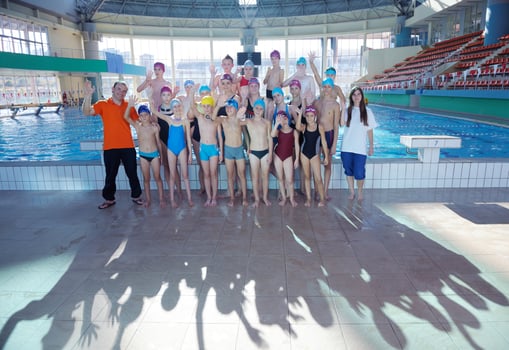 happy children group  at swimming pool photo