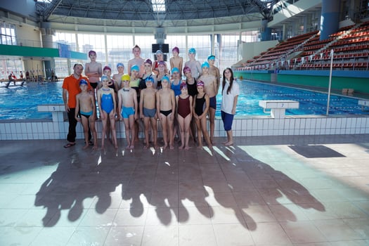 happy children group  at swimming pool photo