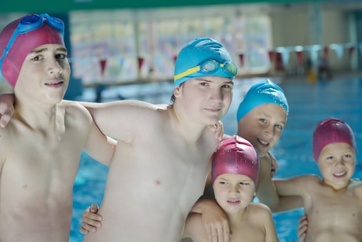 happy childrens at swimming pool photo