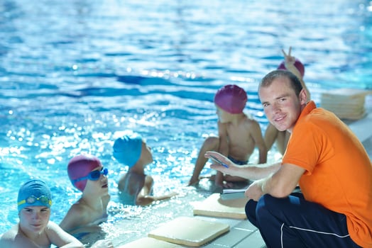 happy children group  at swimming pool photo