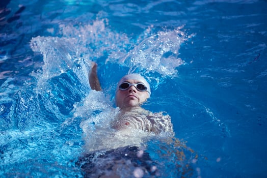 swimmer excercise on indoor swimming poo photo