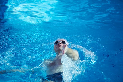 swimmer excercise on indoor swimming poo photo
