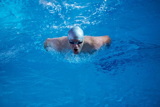 swimmer excercise on indoor swimming poo photo