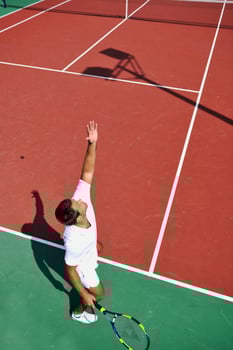 young man play tennis outdoor photo