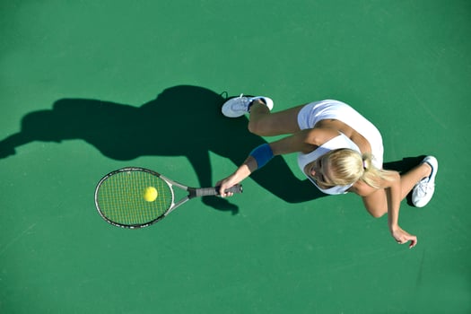 young woman play tennis outdoor photo