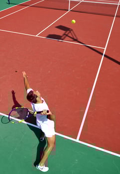 young man play tennis outdoor photo