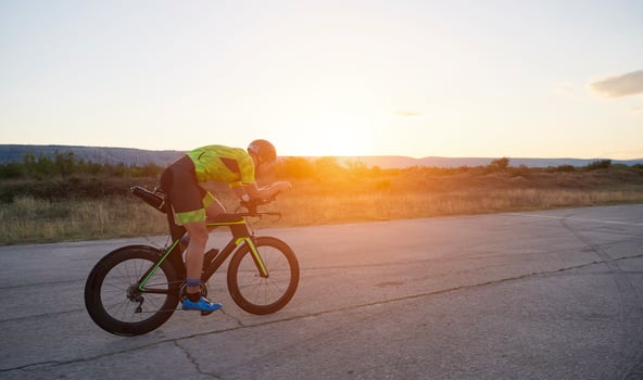 triathlon athlete riding a  bike photo