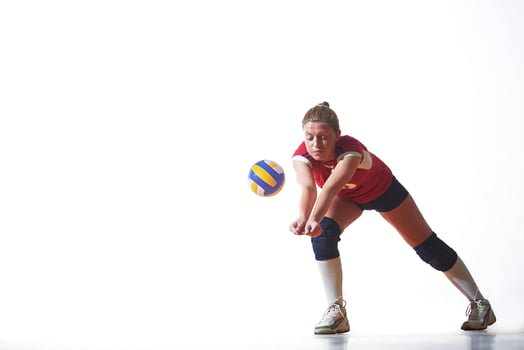 Girl playing volleyball photo