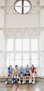 girls playing volleyball indoor game photo